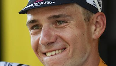 Evenepoel wins Tour de France time trial with vintage performance in Burgundy vineyards