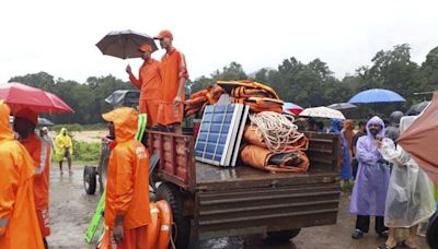 Landslides caused by heavy rains kill 49 and bury many others in southern India