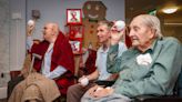 Indoor snowball fight at care home enjoying first restriction-free Christmas