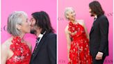 Keanu Reeves and his girlfriend, Alexandra Grant, share a kiss in a rare red-carpet moment at the 2023 MOCA Gala