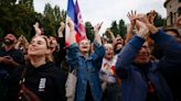 French left-wing coalition projected to beat the far right in surprise second-round result