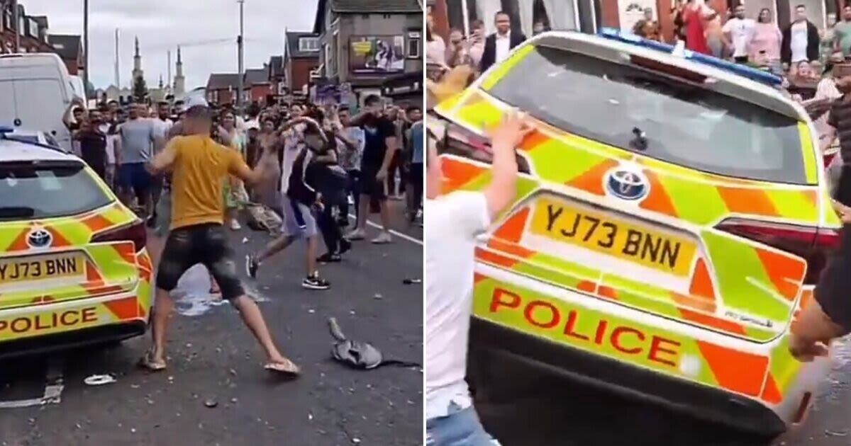 Chaos on streets of Leeds as angry rioting mob smashes up police cars