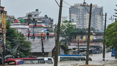 59 dead in Nepal as downpours trigger floods