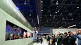 Get ready for transparent TV: Tech giants show off 'glass-like' television screens at CES