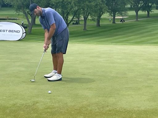 Why did Tony Romo fly to Wisconsin directly after playing celebrity golf in Lake Tahoe? More golf