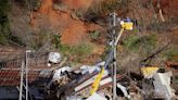 Troops join search for missing in northern Japan landslide