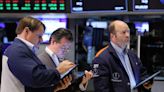 Wall Street stocks end slightly higher as weak jobs data supports rate cut