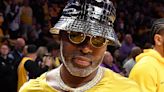 Corey Gamble critics mock star's 'silk dress' and 'plastic' hat look NBA game