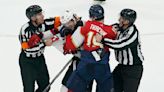 Panthers' Matthew Tkachuk ejected after jumping Devils captain Nico Hischier