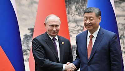 Xi y Putin firman un documento para profundizar las relaciones estratégicas entre China y Rusia - La Tercera