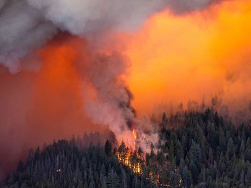 A historic mining community is decimated as firefighters battle massive wildfires in Western United States