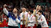 North and South Korea table tennis Olympic medalists pose for shared selfie