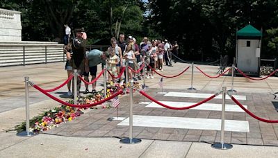 Guests leave hundreds of flowers to honor the Tomb of the Unknown Soldier