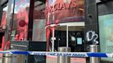 Seven deny criminal damage over bank paint attack