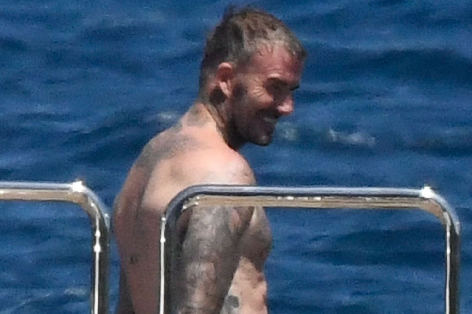 Shirtless David Beckham Shows Off His Tan and Tattoos in Swimsuit on Family Yacht Vacation