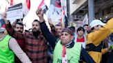 Hundreds in Baghdad protest devaluation of Iraq's currency