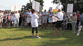 Dozens gather at Tiny Twp. town hall to protest new planned development