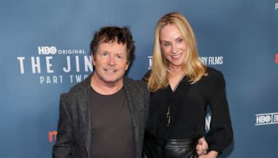 Michael J. Fox Totally Enamored by Wife Tracy Pollan’s Red Carpet Look in New Photos