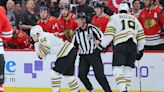 Bruins' Jakub Lauko takes skate to face against Blackhawks, avoids major injury