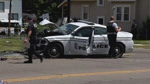 Police cruiser, other vehicle, damaged after crashing in Dayton