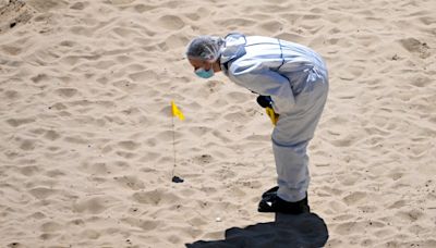 Boy arrested on suspicion of murder after woman is stabbed to death on beach in Bournemouth