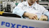 China Seals Off IPhone Maker, CNOOC in Shenzhen to Battle Covid