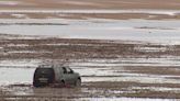 Car stranded on beach still to be removed