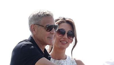 George Clooney's wife Amal puts on a leggy display in Venice