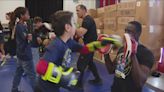 'Jui Jitsu with a Cop' event at Perkins Elementary teaching 4th graders self-defense techniques