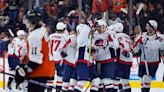 Oshie scores game-winner into empty net as Capitals make playoffs by beating Flyers