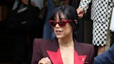 Jenna Ortega flashes her bra in a quirky maroon blazer