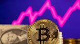 Bitcoin rises after rapid climb to new record