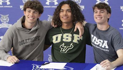 Three Booker T. Washington boys soccer stars sign to play collegiately