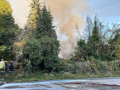 South Vancouver fire sending thick smoke into air