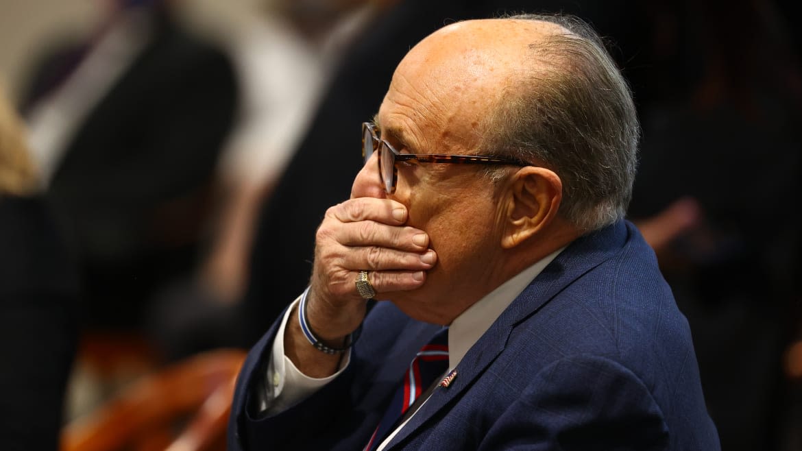 Was Rudy Giuliani Peeing During His Arraignment? You Be the Judge!