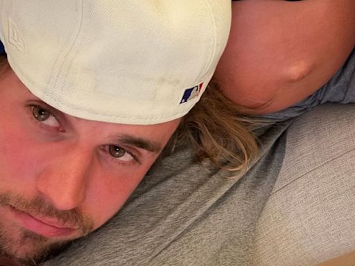 Justin Bieber snuggles up to pregnant wife Hailey's baby bump