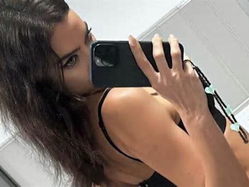 Irina Shayk, 38, strips down to lacy black lingerie for VERY sultry selfie... amid claims she wants to date Tom Cruise, 61