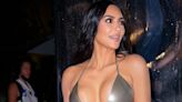 Kim Kardashian Wears A Truly Tiny Blue swimsuit On Tropical Vacation