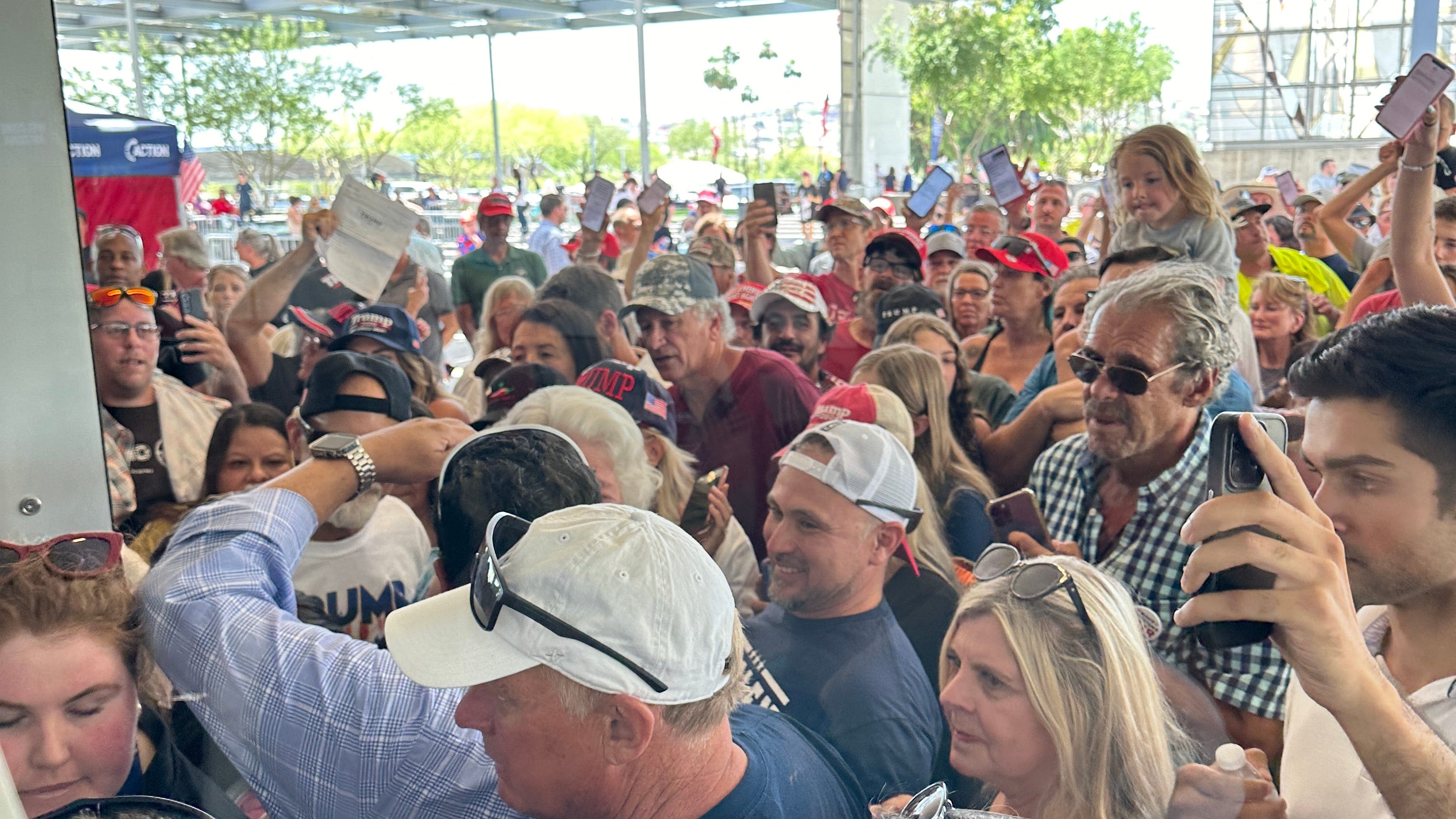 Trump in Arizona: Trump takes the stage to cheers at Dream City Church in Phoenix