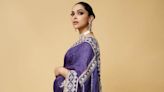 Mum-to-be Deepika Padukone flaunts baby bump in regal purple sari; see pictures here