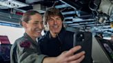 Tom Cruise snaps selfies with crew aboard US Navy aircraft carrier for special screening of Top Gun: Maverick