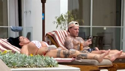 Katie Price relaxes poolside at £760-a-night hotel in Ayia Napa after dodging bankruptcy hearing due to ‘anxiety’