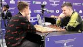Two Russian players sanctioned at World Chess Championship for shameful collusion – video