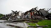 Storm-battered South is again under threat. A boy swept into a drain fights for his life