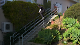 Locked And Loaded: Watch As Kevin Baekkel Battles Heavy Feeble Grind On Sketchy 21 Stair Handrail