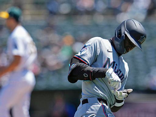 Gordon homers and gets 4 hits to lead Marlins past A's