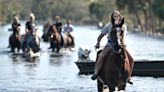 As Ian floodwaters rose, a rush to rescue residents – and livestock: 'We ride in a boat, but the horses can’t'