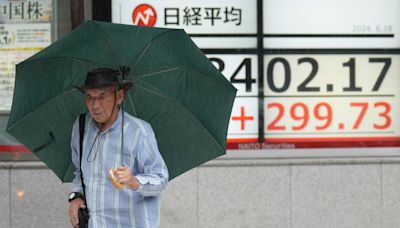 Stock market today: Asian shares mostly gain after Wall St rallies to new records