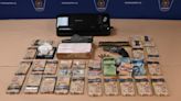 Loaded handgun, drugs and cash seized by London police