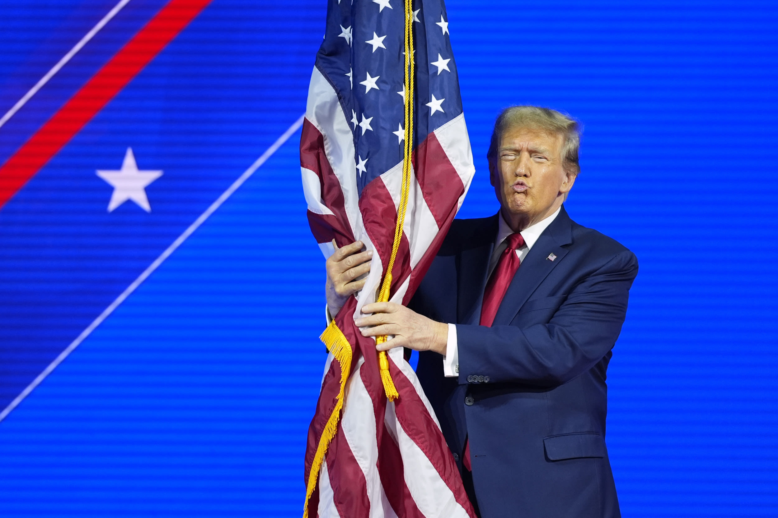 Donald Trump appears to violate U.S. flag code in viral clip